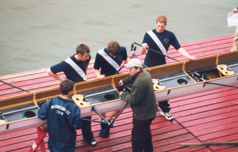 Derek working on a boat with Varsity members company