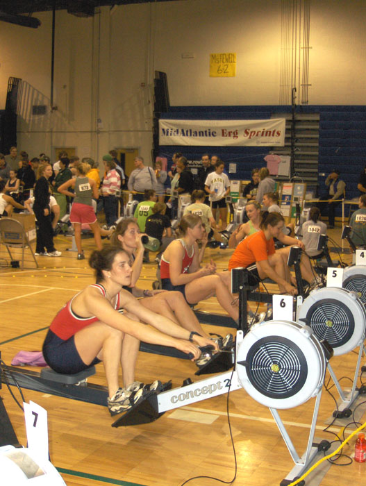 Margot Shumway(middle in red) Girl's Novice Coach prepares to race Open Women 2000 Meter Race.jpg